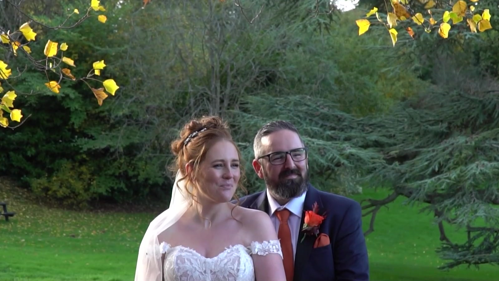 A bride and groom sharing a quiet moment outdoors